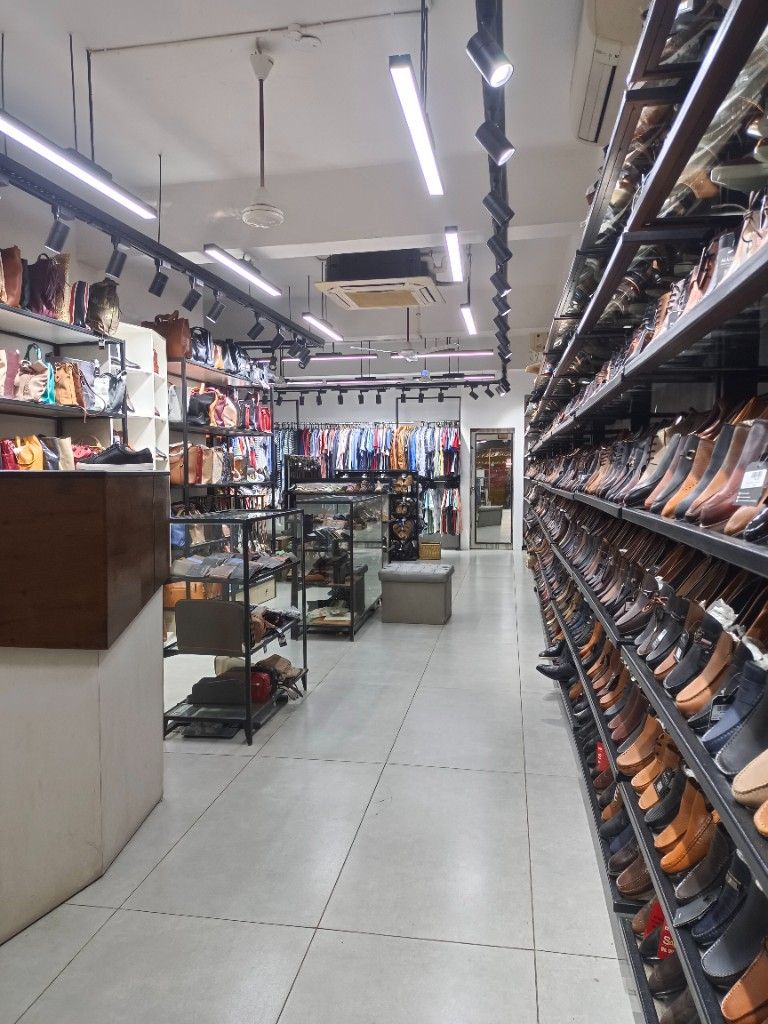 Masees Ambur showroom — men's footwear wall display